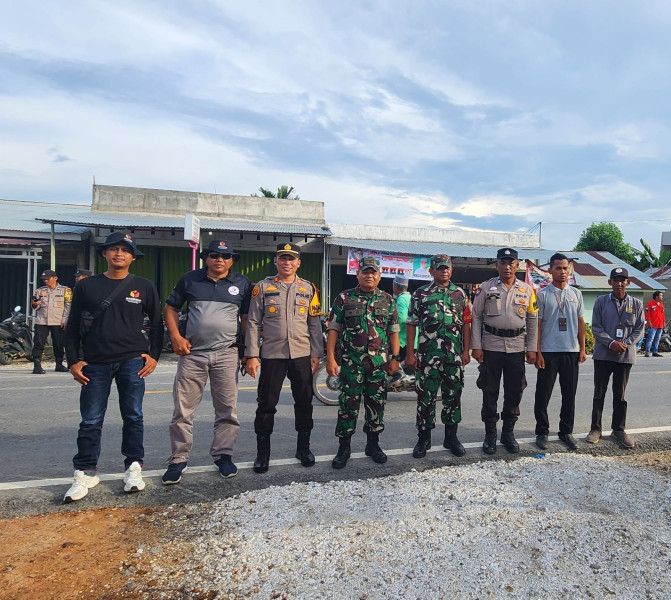 Sinergitas TNI-Polri : Amankan Kampanye Paslon Cabup dan Cawabup di Kecamatan Kempas Inhil