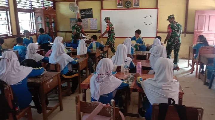 Babinsa Koramil 09/Kemuning: Program Makan Bergizi Gratis Sangat Bermanfaat bagi Masyarakat