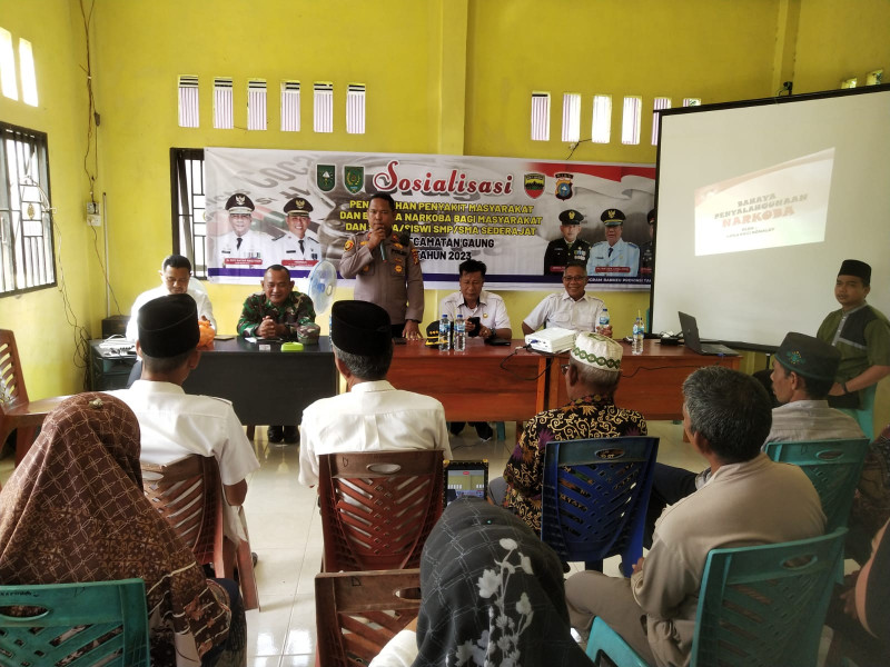 Kapolsek Gaung Iptu Andrianto S.H,M.H Bersama Forkompimcam Gaung Melaksanakan Sosialisasi Pencegahan Penyakit Masyarakat dan Bahaya Narkoba di Wilayah Desa Teluk Kabung