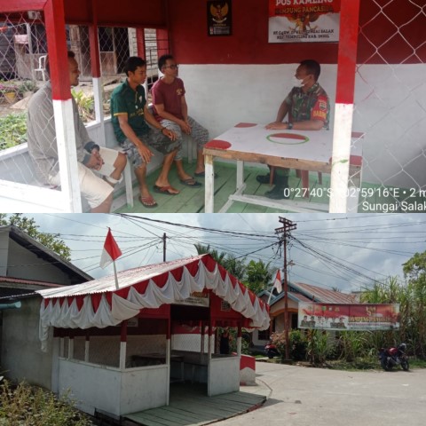 Sambut HUT RI Ke-77, Babinsa Koramil 03/Tempuling komsos Sekaligus Pasang Bendera Merah Putih bersama Warga Kampung Pancasila