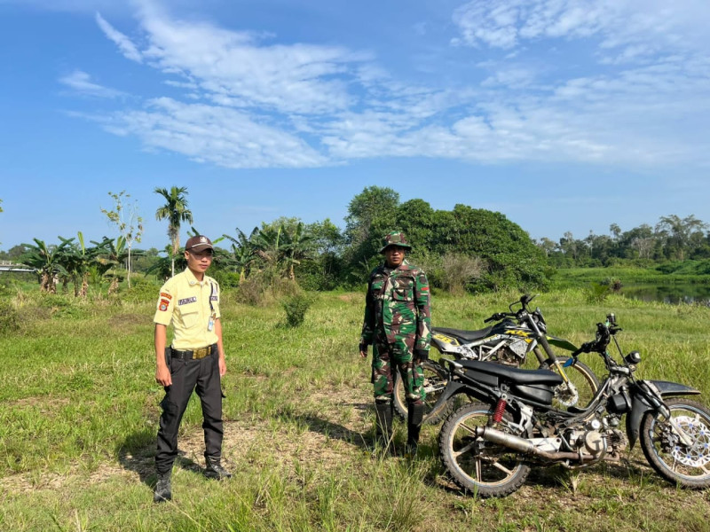 Bhabinsa Koramil 05/Gas Kodim 0314/Inhil Pratu Sandi Wahyudi Gencar Lakukan Patroli Mitigasi