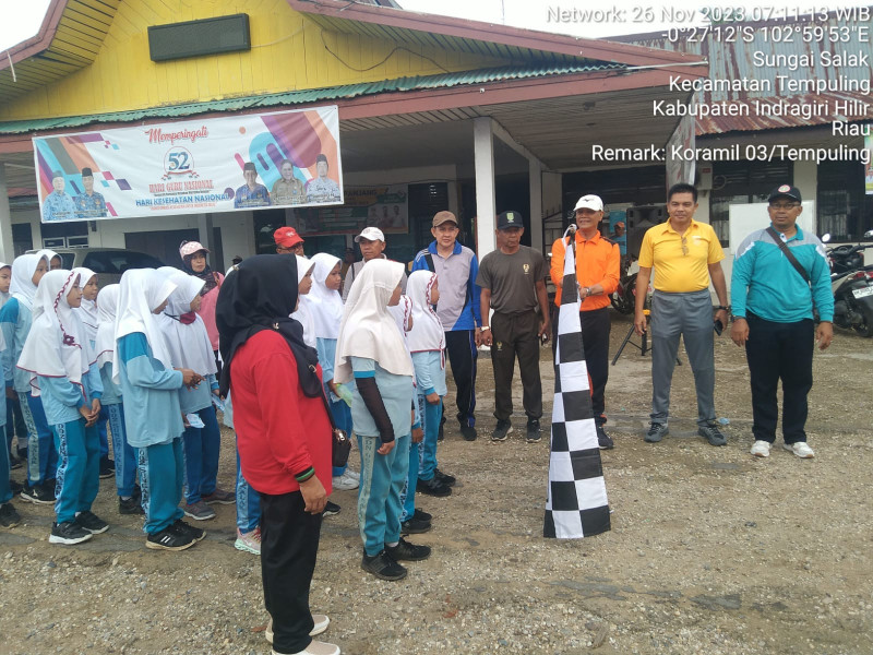 Danramil 03/Tpl Hadiri Gerak Jalan Santai HUT Korpri Dan Hari Guru Nasional Kecamatan Tempuling