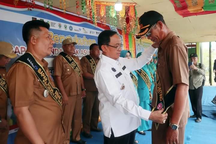 Bupati HM Wardan Lakukan Pengukuhan Bapak dan Bunda Asuh Stunting di Kecamatan Mandah