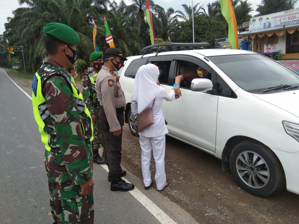 Jelang Libur Nasional, Koramil 09/Kemuning Lakukan PAM di Posko Covid-19 Perbatasan Riau-Jambi