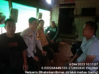 Aiptu Heriyanto Bhabinkamribmas Desa Teluk Merbau Melaksanakan Giat Himbauan Kamtibmas Untuk Pemilu Damai Tertib dan Aman