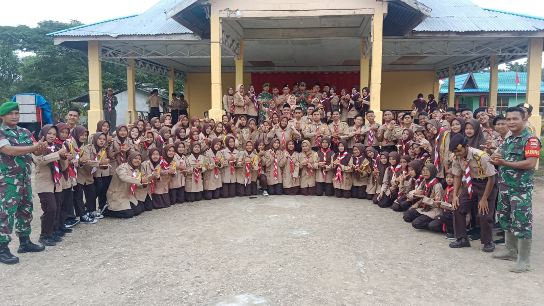 Bhabinsa koramil 05/Gas Hadiri Upacara Hari Ulang tahun Pramuka Ke-62