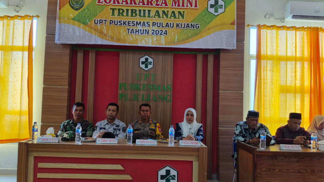 Babinsa Pelda Nofiandi Bersama Perangkat Puskesmas Gelar Rapat Lokakarya Mini Triwulan III