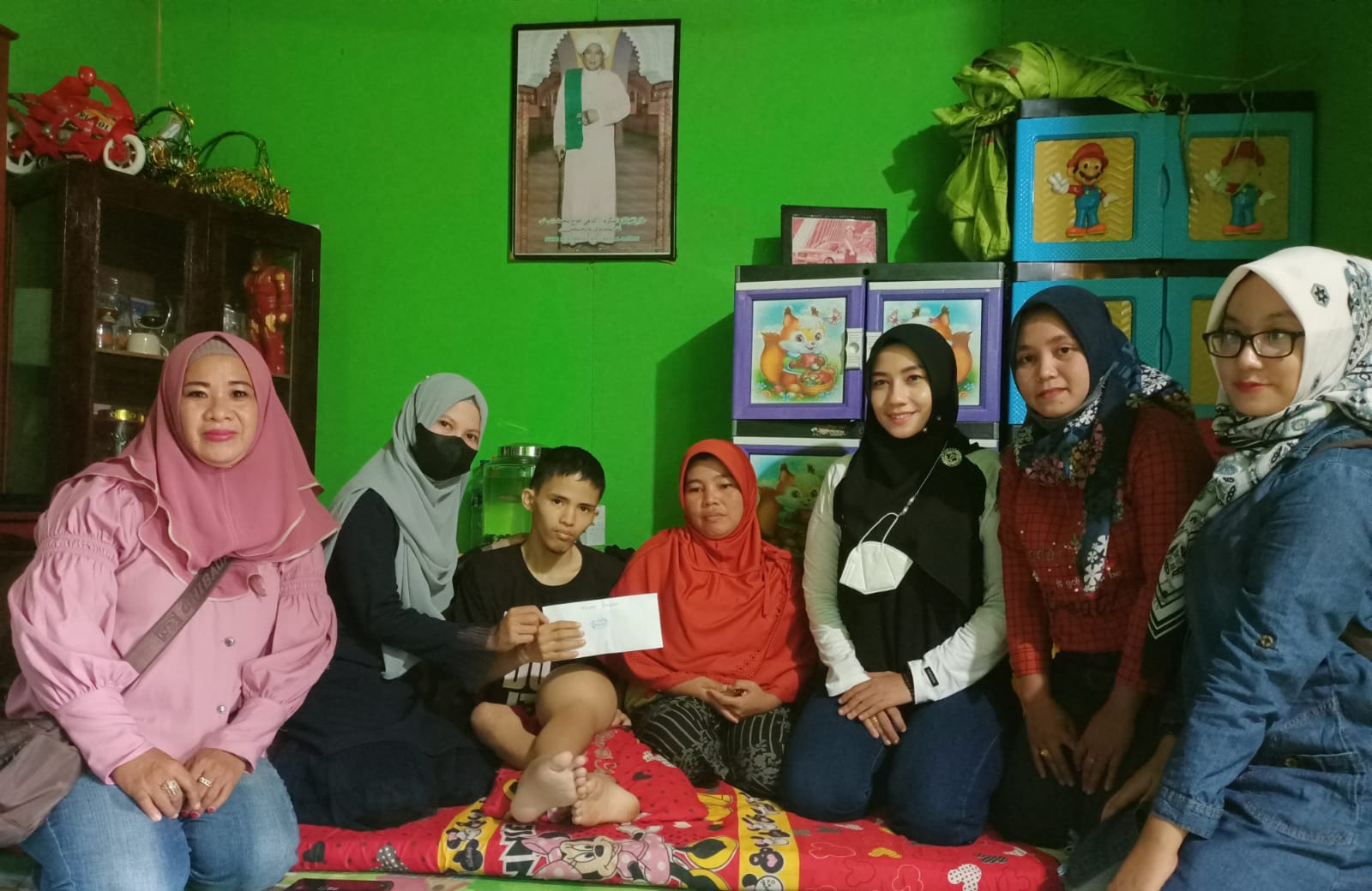 Tim Srikandi Menggelar Penyerahan Donasi Kepada Korban Penderita Tumor