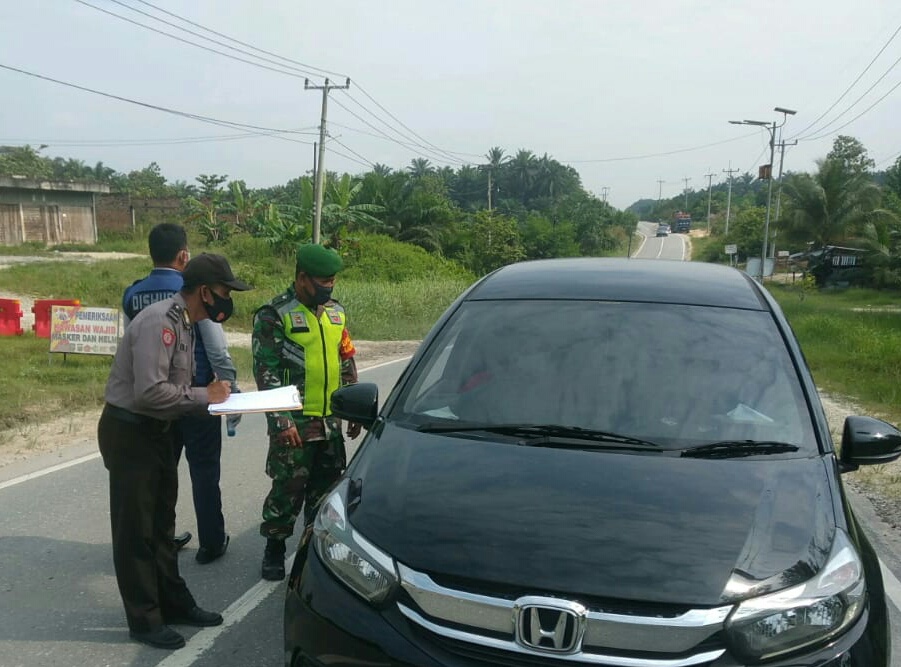 Aparat Gabungan Laksanakan Operasi Yustisi Penegakan Protokol Kesehatan di Jalan Lintas