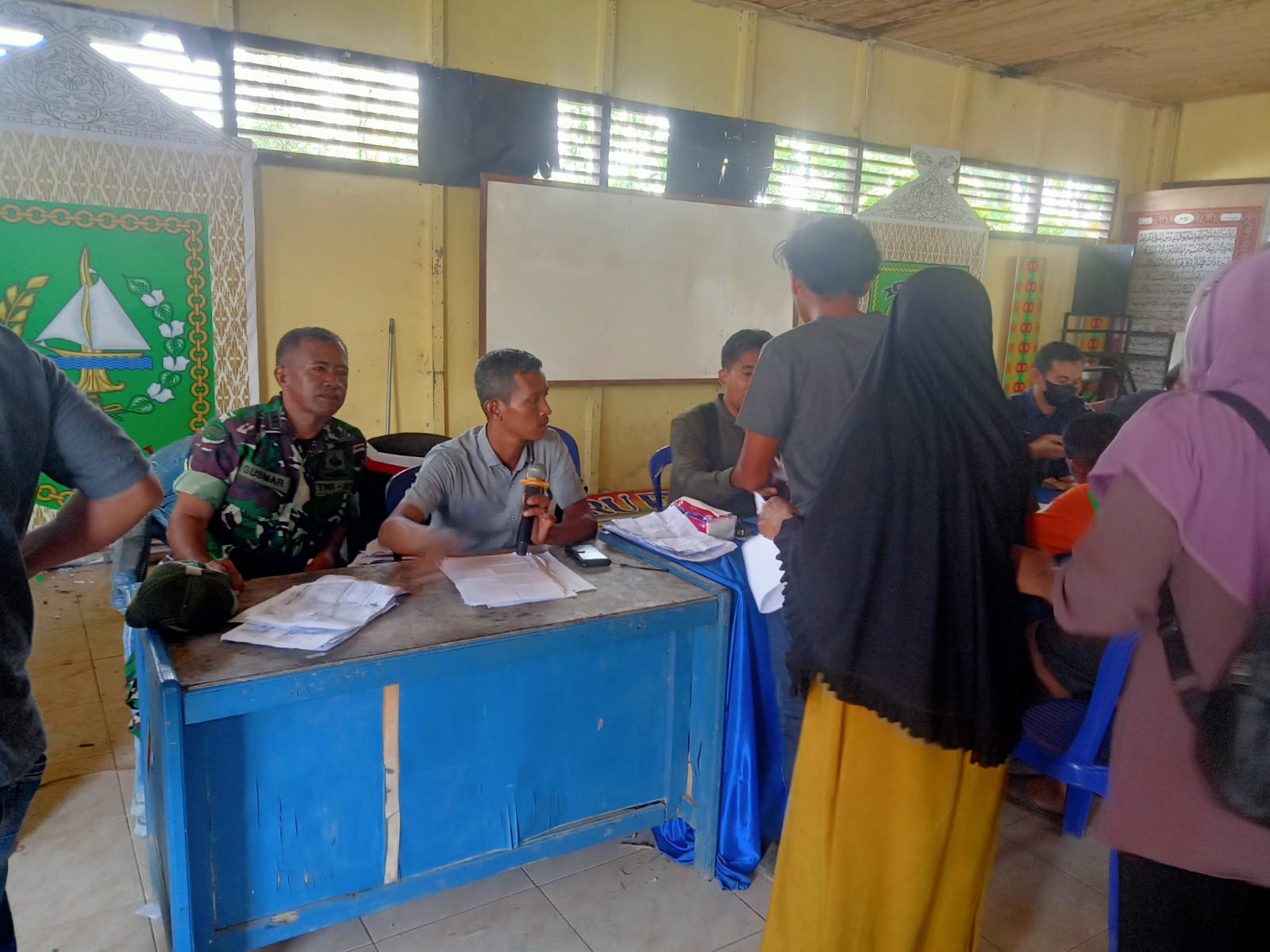 Demi Kelancaran Turnamen, Babinsa Koramil 09/Kemuning Ikuti Koordinasi Dengan Aparat Desa