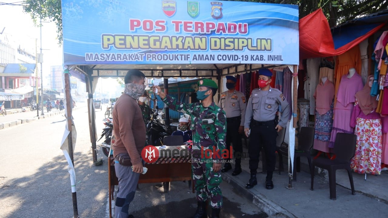 Kodim 0314/Inhil bersama Tim Penegak Disiplin Covid-19 Inhil Siaga di Posko Penjagaan 