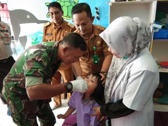 Pelaksanaan Vidcon Oleh Bupati Kabupaten Inhil Yang Didampingi Danramil 09/Kemuning