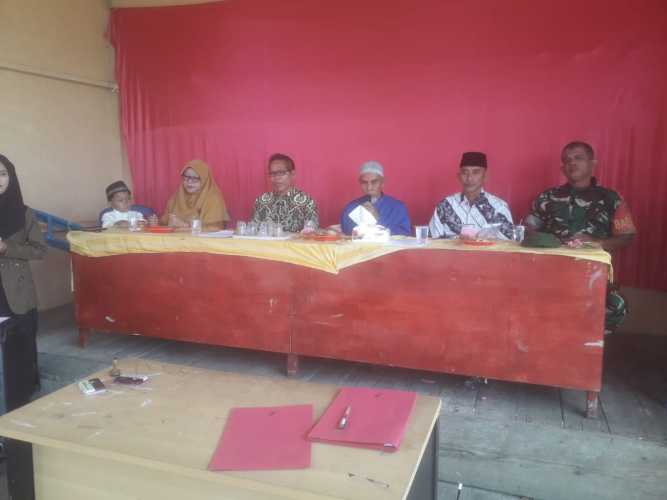 Danramil 04/Kuindra Dampingi Pelantikan Panitia Pantarlih di Balai Desa