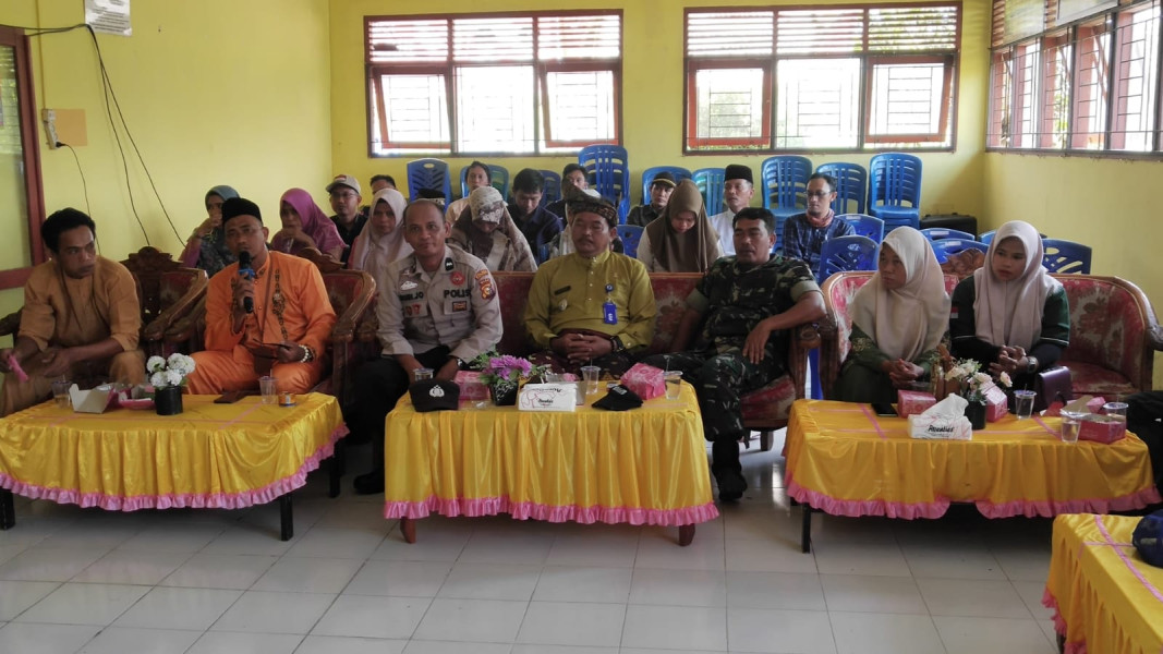 Danramil 07/Reteh Menghadiri Acara Rapat Pleno Terbuka di Wilayah