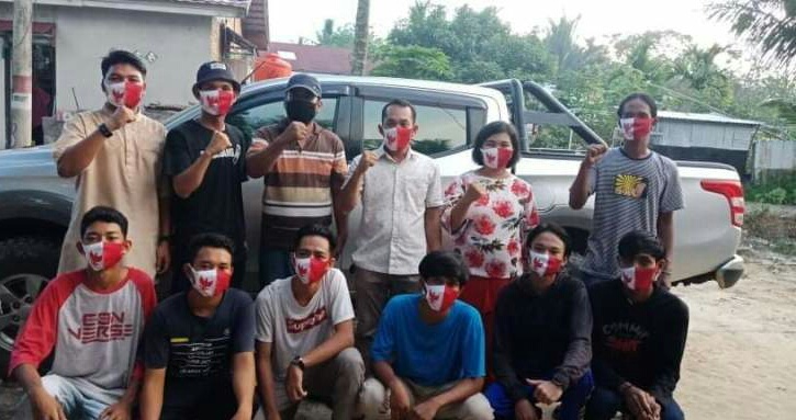 Anggota DPRD Siak Ini Berbagi Ratusan Sembako dan Masker