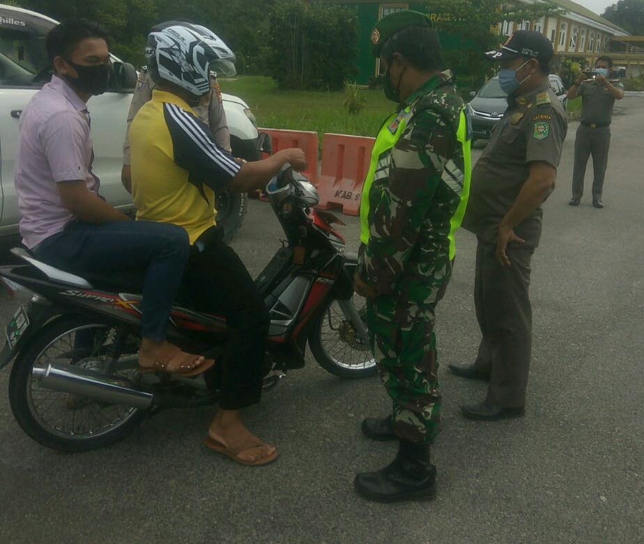 TNI-Polri dan Satpol PP Siak Laksanakan Pengamanan Tempat Isolasi di Asrama Haji