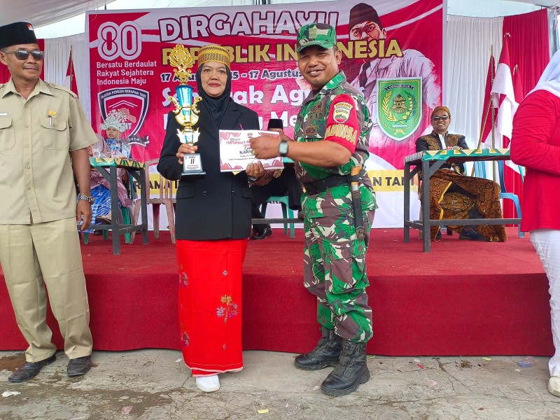Babinsa Koramil 03/Tpl Hadiri Kirap Budaya dalam Peringatan HUT RI ke-80 di Kecamatan Kempas Yang Berlangsung Meriah
