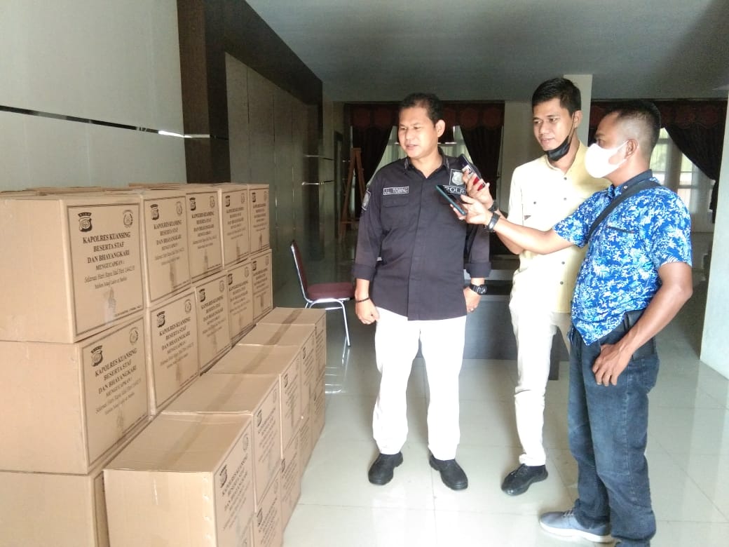 Polres Kuansing Berbagi Bingkisan Lebaran Idul Fitri 1442 H Kepada Awak Media