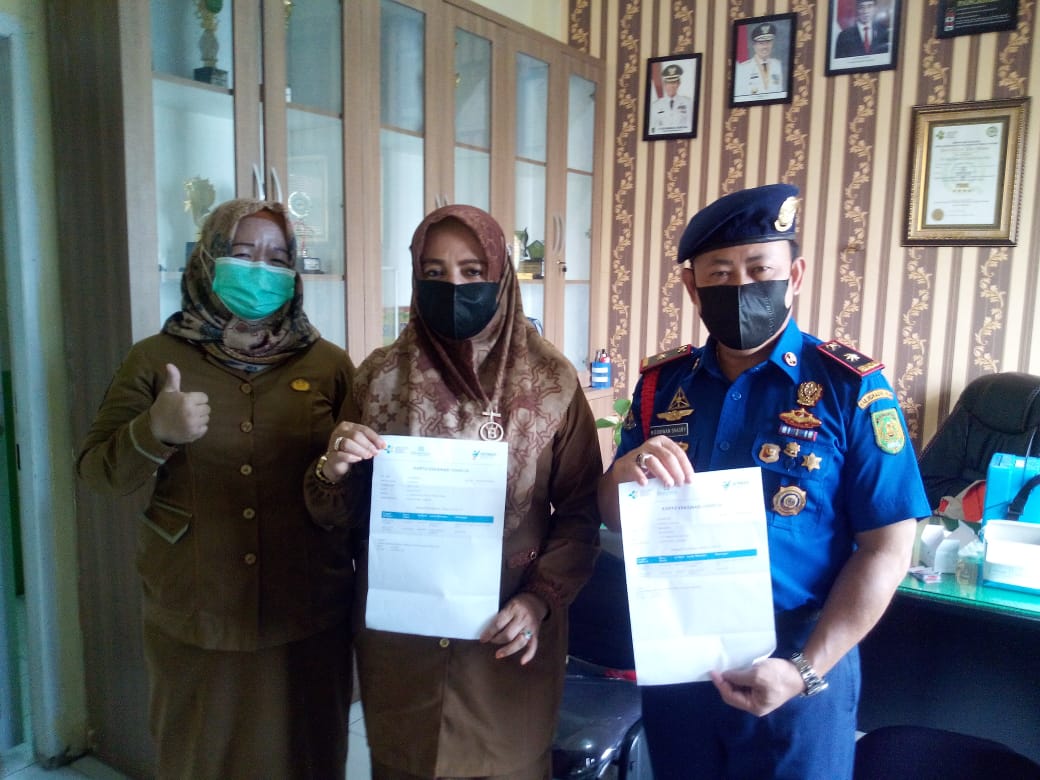 Kepala DPKP Inhil Beserta Istri Jalani Vaksinasi Covid-19 Tahap II