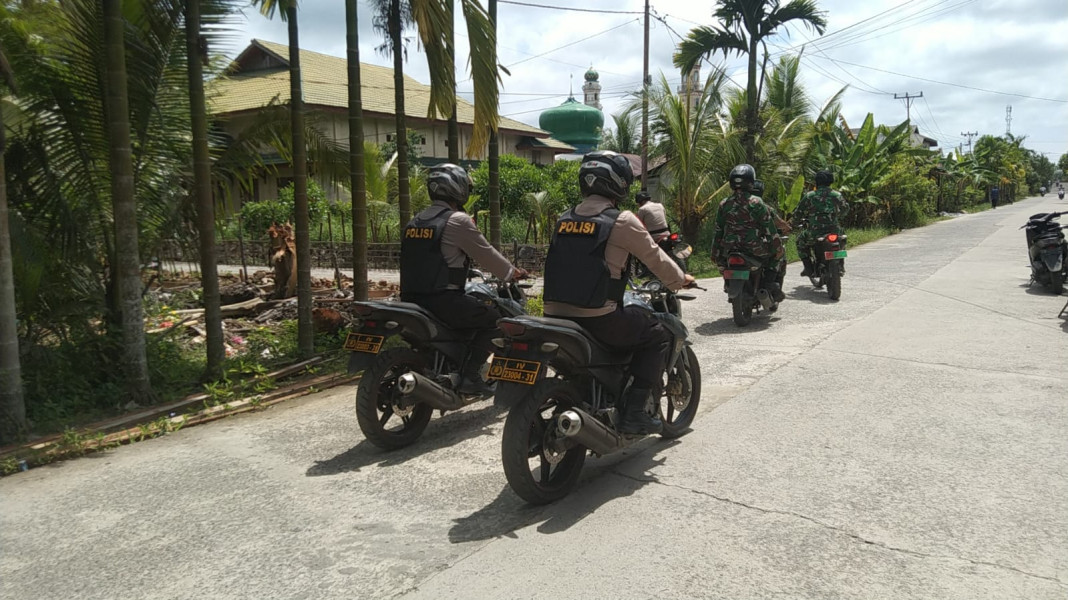 Babinsa Koramil 05/Gas Pratu Risma Saputra Laksanakan Patroli Bersama Anggota Polsek Gas Guna Menjaga Situasi yang Aman dan Kondusif