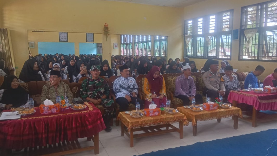 Wakili Danramil, Babinsa Koramil 09/Kemuning Hadiri Pemilihan Ketua PGRI Kemuning Tahun 2025