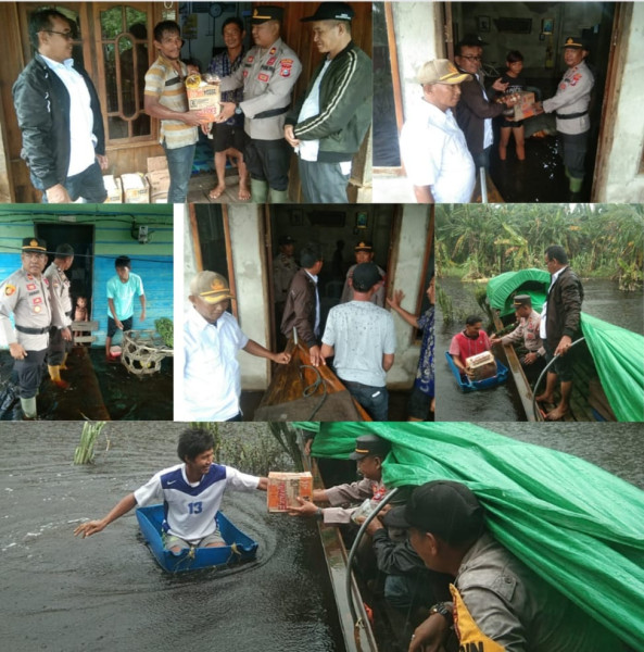 Kapolsek Gaung, Unsur Prokopincam dan Pihak PT. GIN Menyerahkan Bansos Kepada Warga Terdampak Bencana Banjir Yang Terjadi di Desa Lahang Hulu
