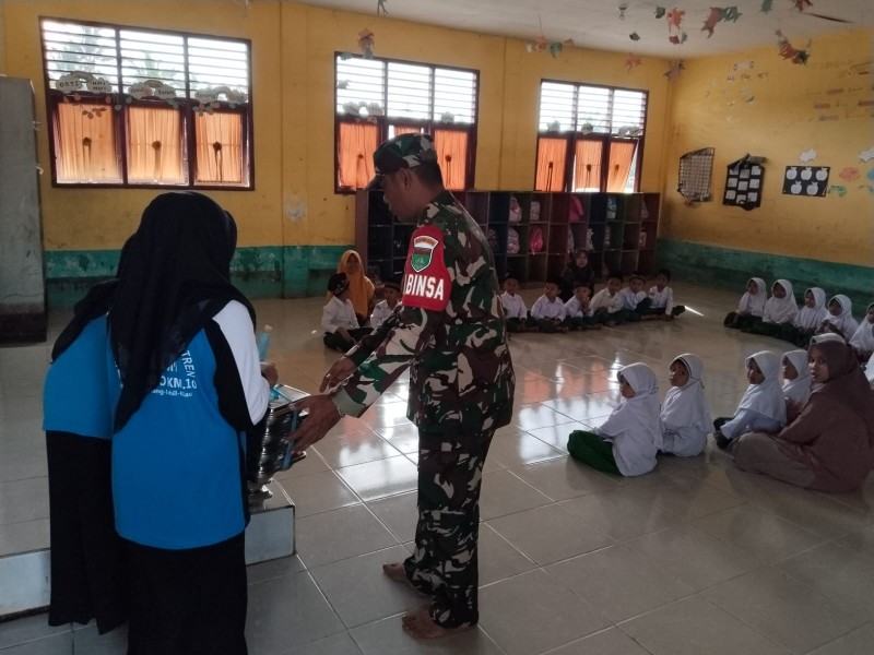 Koramil 09/Kemuning Rutin Melaksanakan Pendampingan Makan Bergizi Gratis di Desa Lintas Utara