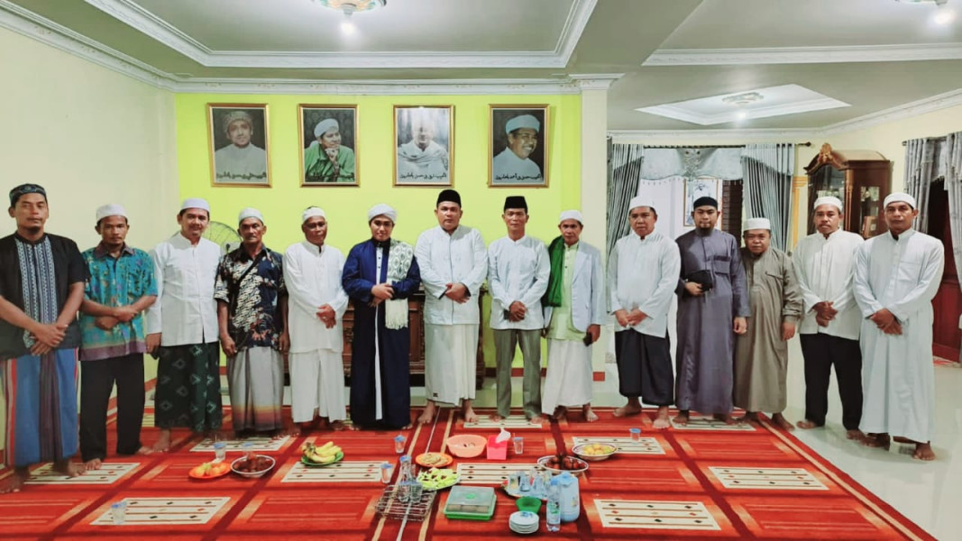 Tingkatkan Tali Silaturahmi Antar Umar, Danramil 10/Pelangiran Menghadiri Undangan Peringatan Maulid Nabi Muhammad Saw