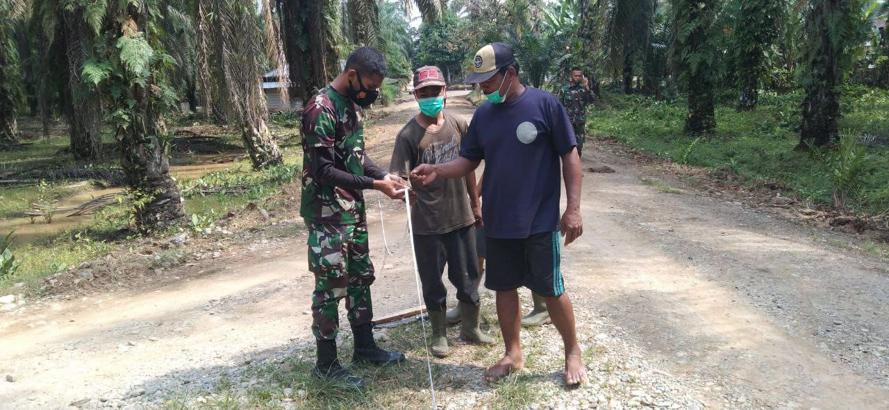 Ukur Volume, Satgas TMMD Ke-110 Kodim 0313 KPR Pasang Patok Jalan 