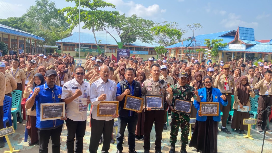 Lapangan SMKN 1 Penuh Semangat: KNPI Inhil, TNI, Polri dan Kejaksaan Satu Barisan Didik Generasi Emas
