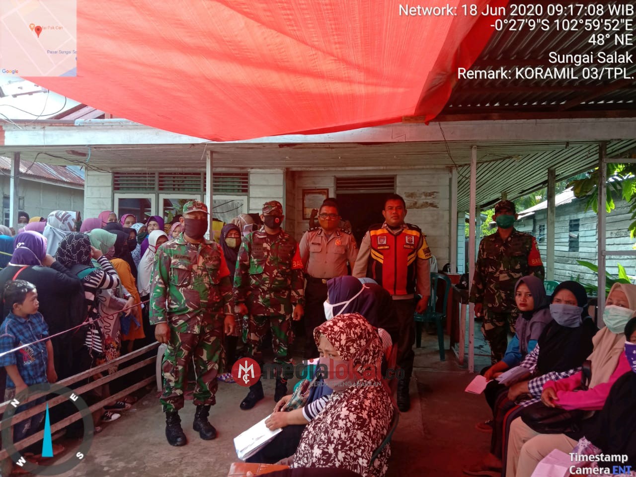 TNI-Polri Terus Kawal Penyaluran BST di Kecamatan Tempuling