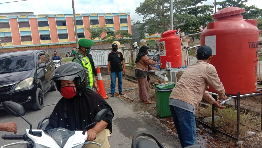 Aparat Gabungan Laksanakan Penegakan Disiplin Protokol Kesehatan di Pasar Raya Belantik