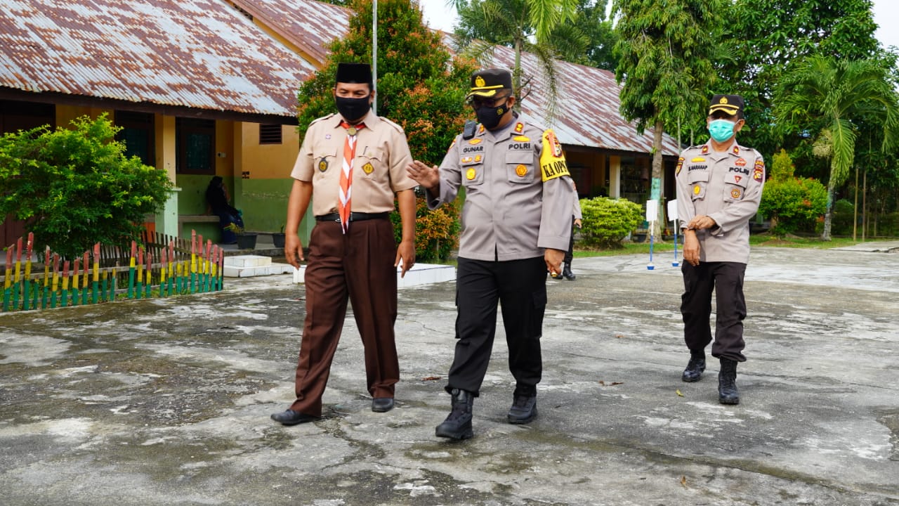 Cegah Covid - 19, Kapolres Siak Kunjungi Beberapa Sekolah di Kecamatan Siak