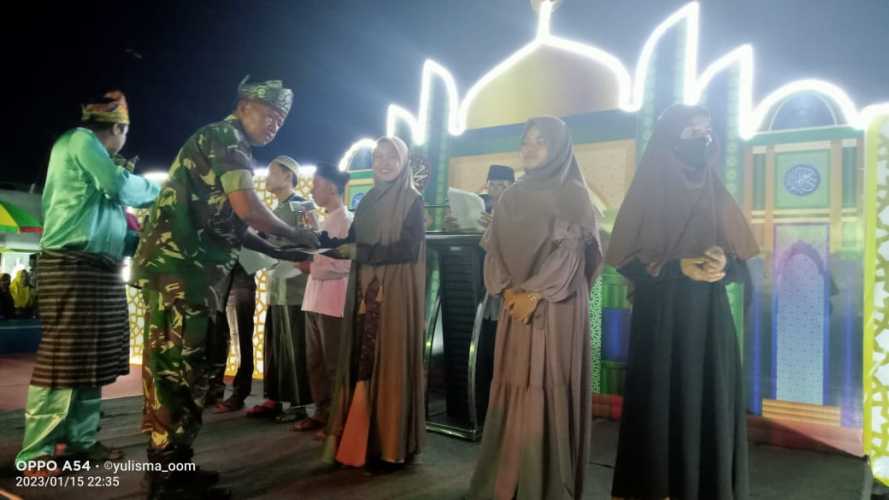 Babinsa Kota Baru Sebrida Ikuti Penutupan MTQ Antar Dusun