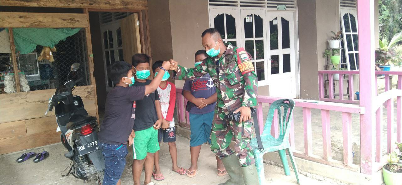 Satgas TMMD Ke-110 Kodim 0313 KPR Bekali Prokes Ke Anak Usia dini 