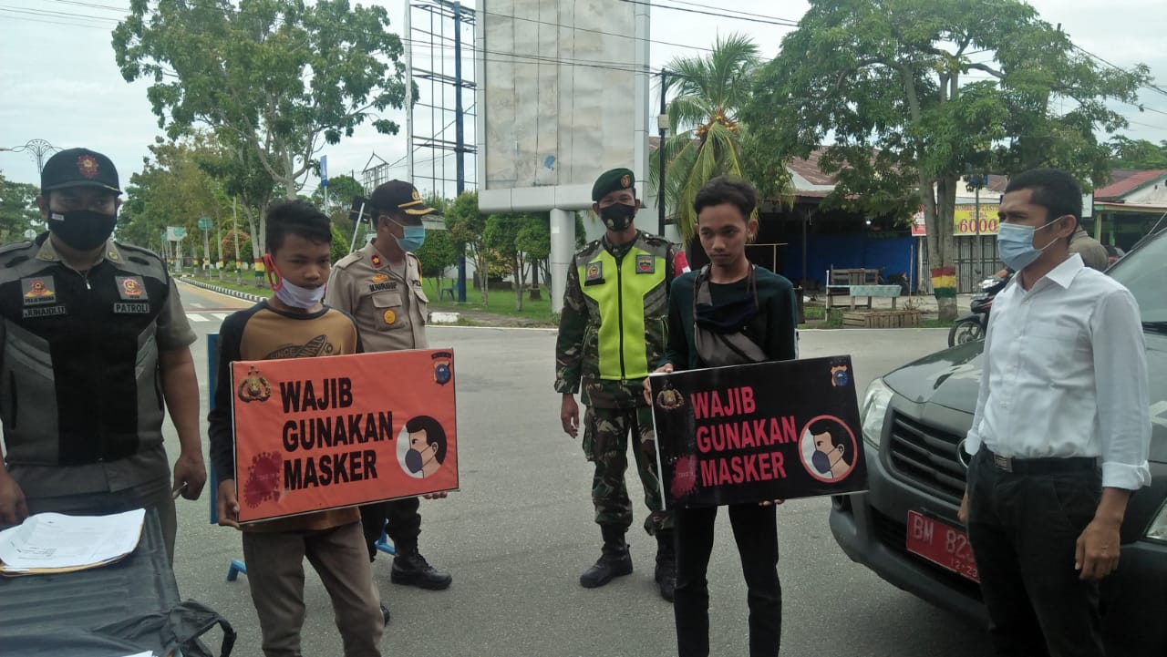 Aparat Gabungan TNI, Polri dan Satpol PP Laksanakan Operasi Yustisi Guna Cegah Pandemi Covid-19