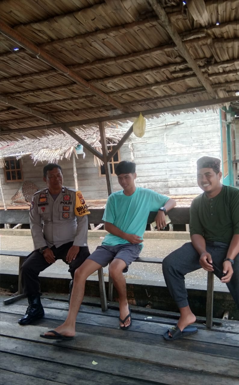 Bhabinkamtibmas Desa Teluk Merbau Aiptu Heriyanto Laksanakan Sambang Warga dan Sampaikan Pesan Kamtibmas