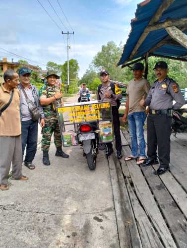 Tingkatkan Minat Baca Masyarakat, Polsek Kateman Giat Perpustakaan Keliling