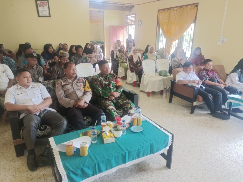 Babinsa Koramil 09/Kemuning Hadiri MKPT Tahunan, Bagi Sembako dan Doorprize kepada Masyarakat